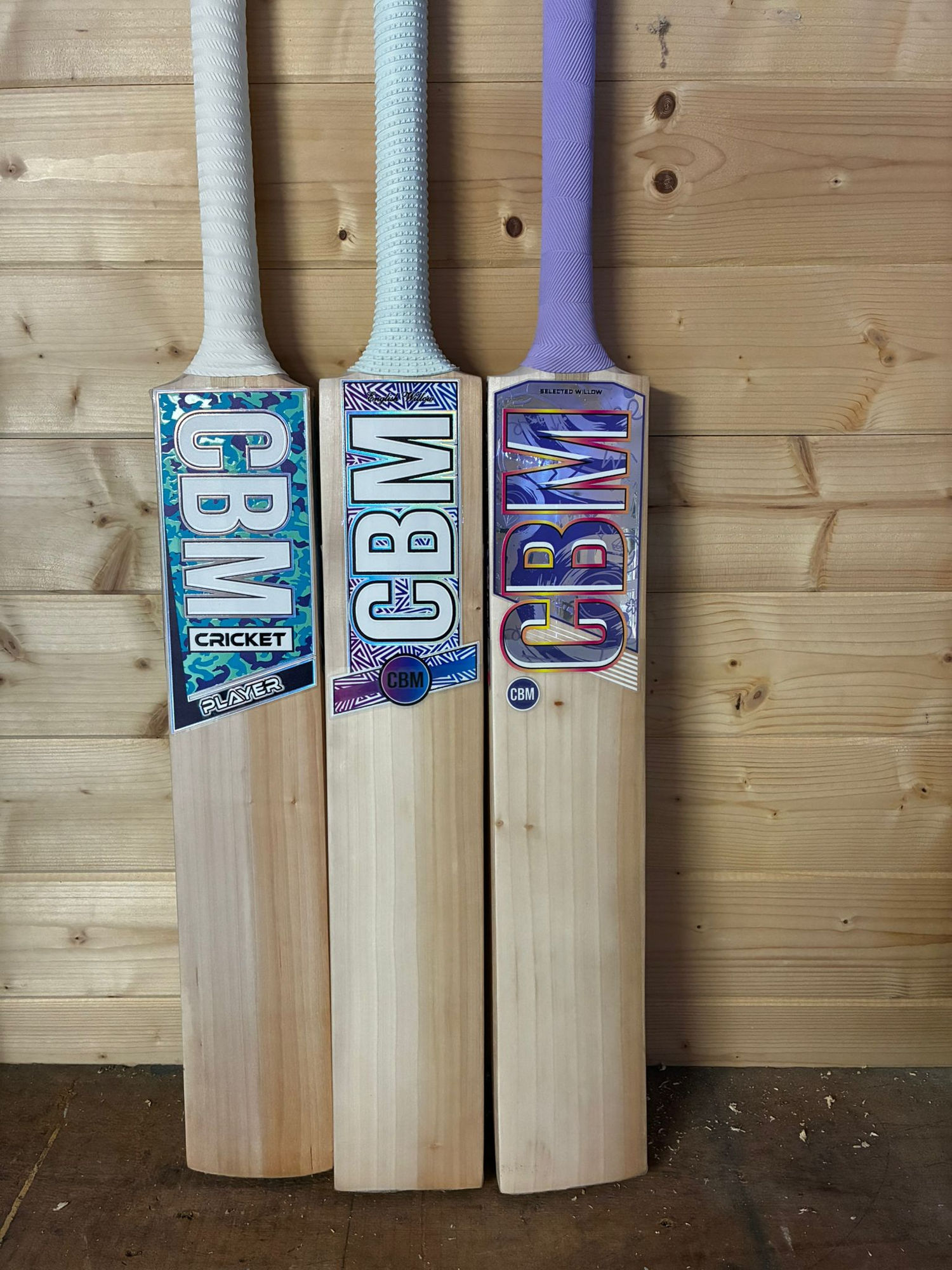The CBM Noir bat with a dark, oil-finished face.