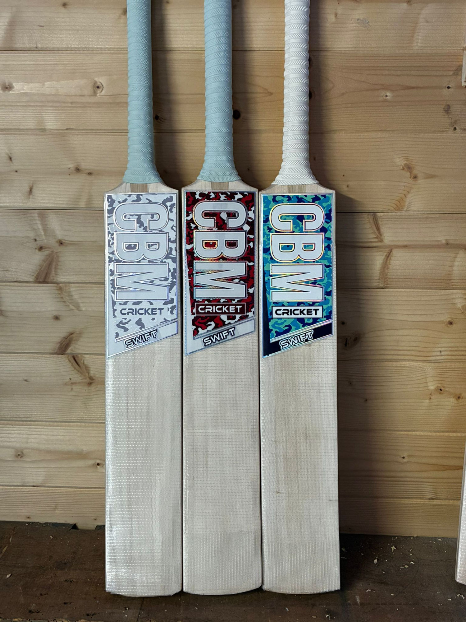 CBM Swift bats, three side by side.