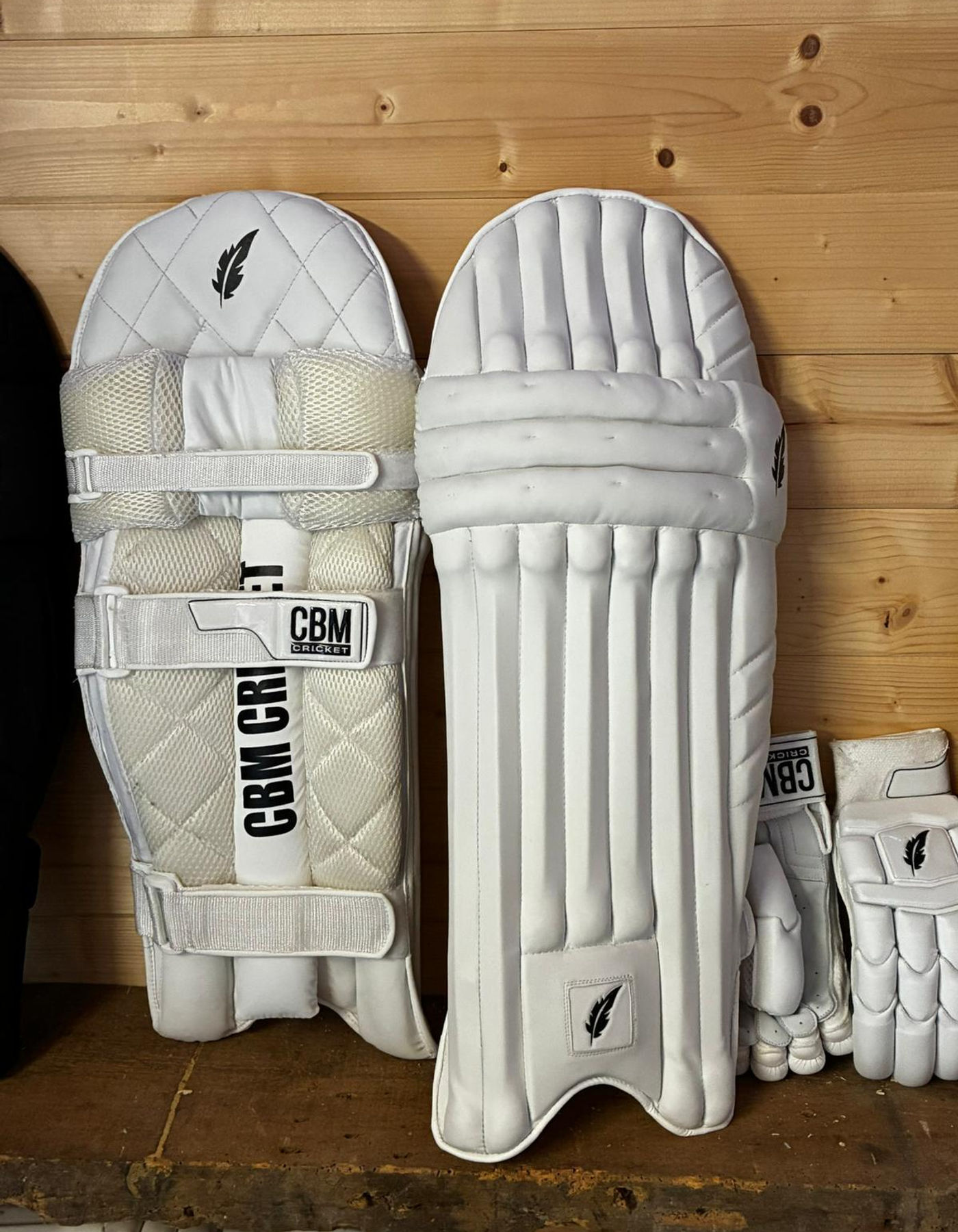 A pair of CBM batting pads.